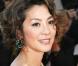 Michelle Yeoh, superbe avec des bijoux Chopard, lors de la montée des marches, à Cannes, en mai 2009 !