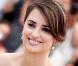 Penélope Cruz, superbe avec des bijoux Chopard, lors de la montée des marches, à Cannes, en mai 2009 !