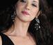 Asia Argento, superbe avec des bijoux Chopard, lors de la montée des marches, à Cannes, en mai 2009 !