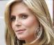 Heidi Klum, très enceinte, continue son émission et embête son partenaire... Quelle coquine !