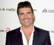 Simon Cowell, en vacances à Saint-Tropez, a oublié... sa crème solaire ! C'est une écrevisse !