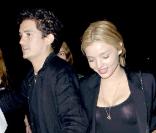 Orlando Bloom et Miranda Kerr assistant au concert des Kings of Leon le 22 août 2009 à Los Angeles