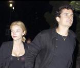 Miranda Kerr et Orlando Bloom assistant au concert des Kings of Leon le 22 août 2009 à Los Angeles