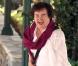 Susan Boyle sort de son hôtel californien de Los Angeles. Sourire aux lèvres et gardes du corps aux basques...