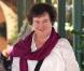 Susan Boyle sort de son hôtel californien de Los Angeles. Sourire aux lèvres et gardes du corps aux basques...