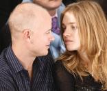 Natalia Vodianova et son mari Justin Portman au défilé Givenchy, le 5 octobre 2005 à Paris