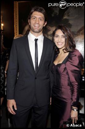 Caterina Murino et son amoureux Pierre Rabadan au défilé Dolce & Gabbana à Milan, le 27 septembre 2009