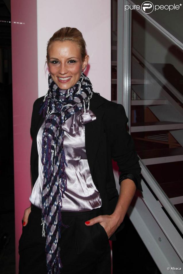 Vincent McDoom et Elodie Gossuin lors de la soirée pour le lancement de la chaîne Tresor TV à Paris le 22 octobre 2009