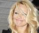 Pamela Anderson : Un grand sourire aux lèvres... et une tenue incroyable !