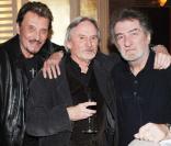 Exclusif : Eddie Mitchell, Johnny Halliday et Claude Bouillon. Soirée de départ de Claude Bouillon après la vente du restaurant le  Balzac  dont il était propriétaire avec Hallyday. Le 28 février 2009. 