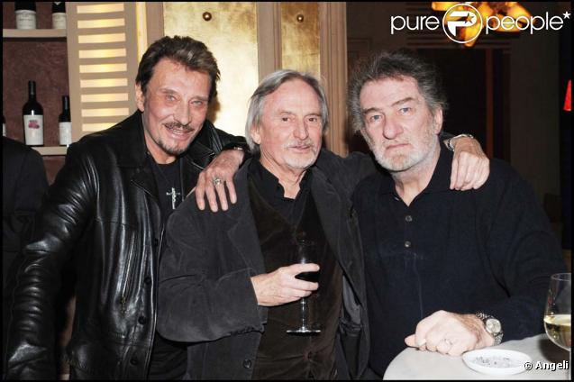 Exclusif : Eddie Mitchell, Johnny Halliday et Claude Bouillon. Soirée de départ de Claude Bouillon après la vente du restaurant le  Balzac  dont il était propriétaire avec Hallyday. Le 28 février 2009. 