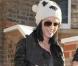 Katy Perry vous donne un avant-goût de Noël avec son bonnet et ses chaussettes hautes. So cute...