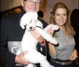 Nelson Monfort avec sa femme et son woofy qui ressemble à un caniche au Gala de la Truffe, chez Lancel, le 16/11/09