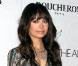 Nicole Richie opte pour un style bohème-chic lors du gala de charité the Art of Elysium's le 16 janvier 2010 à Los Angeles. Imprimés, pochette vernie rouge et chevelure brune ondulée... Nicole est souriante et rayonnante !