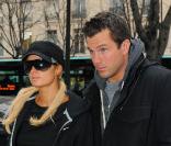 Paris Hilton et Doug Reinhardt font du shopping sur l'avenue des Champs Elysees et rue du Faubourg St Honoré à Paris le 9 février 2010. Le couple s'est rendu chez Colette, Chanel et Sephora avant de rejoindre le Ritz 