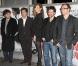 La ravissante Louise Bourgoin entourée de Christophe Blanc, François Cluzet, Jonathan Zaccaï et Olivier, à l'occasion de l'avant-première de  Blanc comme neige , dans l'enceinte du MK2 Bibliothèque, à Paris, le 9 mars 2010.