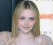 La mignonne Dakota Fanning, à l'occasion de l'avant-première de The Runaways , à New York, le 17 mars 2010.