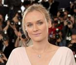 Diane Kruger pose pour le photocall du film Joyeux Noël lors du festival de Cannes en 2005 