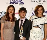 Au centre : Bonnie Wright, Daniel Radcliffe et Emma Watson lors des National Movie Awards à Londres le 26 mai 2010