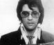 Ce portrait d'Elvis Presley a été prise lors d'un passage du King par les bureaux du FBI en 1970.  