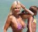 Shauna Sand, sa fille ainée et son petit ami passent l'après-midi sur la plage de Miami le 18 août 2010