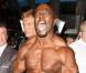 L'équipe du film Expendables a investi la bourse de New York le 19 août 2010: Terry Crews affiche ses muscles autour de Sylvester Stallone, Dolph Lundgren et Jason Statham 