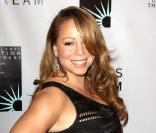 Mariah Carey présente  Oh Santa , son dernier single, premier extrait de son nouvel album de chant de Noël,  Merry Christmas II You .