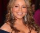 Mariah Carey présente  Oh Santa , son dernier single, premier extrait de son nouvel album de chant de Noël,  Merry Christmas II You .