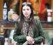 Michelle Trachtenberg se la joue cool mais "in" avec son Mulberry nude à la main, vêtue d'un legging noir et d'une veste kaki savamment associée à un foulard léopard.