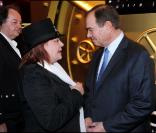 Régine et Patrick Ollier au restaurant Gioia, au VIP Room, le 7 décembre 2010. Présentation du dernier bijou d'Edouard Nahum.