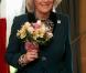 Le 22 février 2011, tandis que son mari le prince Charles rencontrait Cheryl Cole, Camilla Parker Bowles se déplaçait dans un centre de réhabilitation de la police.