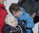 La princesse Marie et le prince Joachim de Danemark, le 17 février 2011 lors de leurs vacances aux sports d'hiver à Verbier, dans les Alpes suisses, avec leur fils Henrik, ainsi que Nikolai et Felix, les garçons nés du 1er mariage de Joachim.