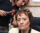 Annie Girardot sur le tournage des Brasseurs d'Affaires en septembre 2006 en Russie avec son réalisateur. Elle est équipée d'une oreillette pour pouvoir travailler.