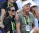 Dans les travées du Tennis Center de Crandon Park, le 28 mars 2011, Greg Norman Kirsten Kutner, sa troisième femme, ont assisté à la victoire de Roger Federer sur Juan Monaco. 