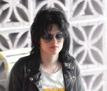 Kristen Stewart dans la peau de Joan Jett sur le tournage de  The Runaways , à Los Angeles, le 28 juin 2009. 