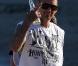 Pink, enceinte, et son mari Carey Hart sur la plage à Malibu le 31 mars 2011