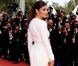 Cheryl Cole face aux photographes. Un exercice qu'elle connaît bien. Elle est époustouflante de beauté pour la montée des marches du 64e Festival de Cannes le 13 mai.