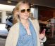  Même en ville, Diane Kruger soigne son look et opte pour du jean et des tons beiges. Los Angeles, 9 avril 2011 