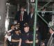 DSK rejoint son nouveau domicile entouré de policiers et gardes du corps, un loft très luxueux à Tribeca le 25 mai 2011 !