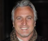 <p>David Ginola en octobre 2010 à Londres</p>