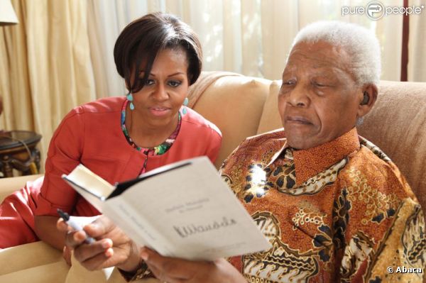 Michelle Obama accompagnée de ses filles lors de sa visite en Afrique du Sud,a rencontré Nelson Mandela, le 21 juin 2011