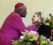 Charlene Wittstock a retrouvé le sourire en Afrique du Sud, notamment lors de sa rencontre avec Desmond Tutu et de ses déplacements auprès d'associations, lors sa lune de miel passablement perturbée avec le prince Albert début juillet 2011.