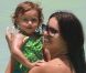 Adriana Lima et sa fille Valentina lors d'un séjour détente à Miami. Le 25 juillet 2011