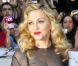Madonna, portant une robe Tom Ford, sur le tapis rouge de la présentation de W.E. au festival de Toronto le 12 septembre 2011