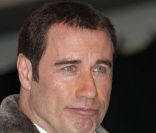 John Travolta assure la promotion d'un nouveau jet privé de la marque Bombardier, à l'aéroport de Burbank à Los Angeles, le 20 septembre 2011.