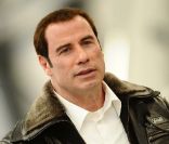 John Travolta assure la promotion d\'un nouveau jet privé de la marque Bombardier, à l\'aéroport de Burbank à Los Angeles, le 20 septembre 2011.