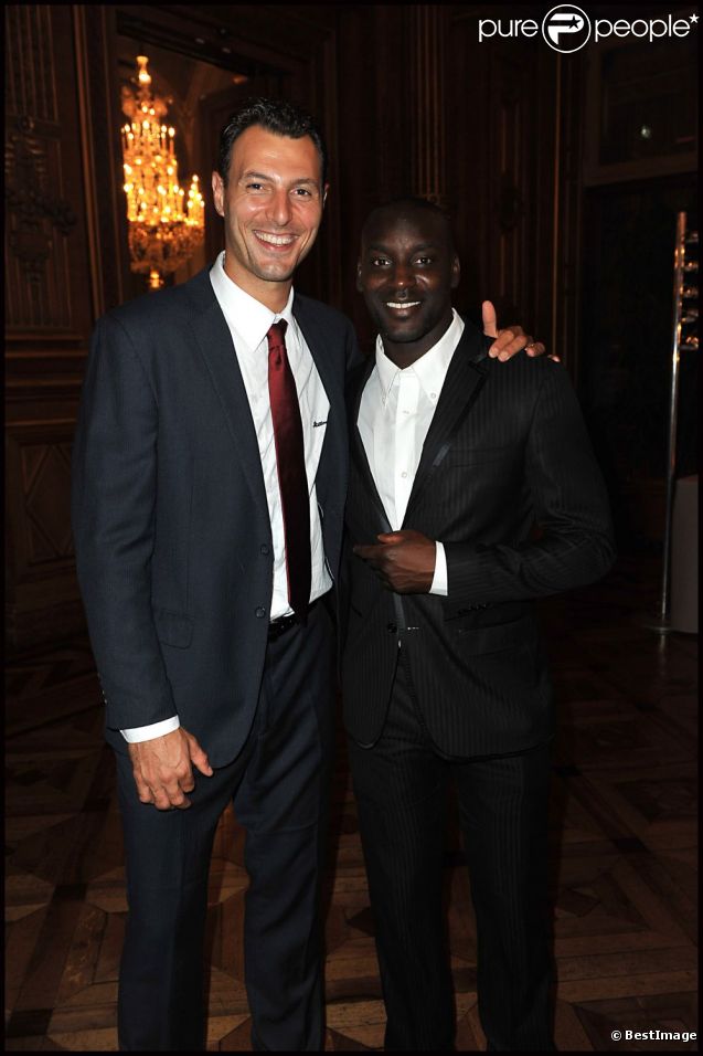 Jérôme Fernandez  et Ladji Doucouré lors du Par Coeur Gala, à l'Hôtel de Ville, à Paris. 26 septembre 2011