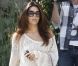 Eva Longoria tente de garder le moral malgré la banqueroute de son restaurant à Las Vegas. Los Angeles le 4 octobre 2011