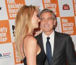Stacy Keibler et George Clooney, amoureux et complices, lors de l'avant-première du film The Descendants au festival du film de New York le 16 octobre 2011