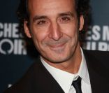 Alexandre Desplat arrive à la projection des Marches du pouvoir, le 18 octobre 2011, à Paris.